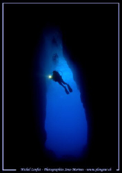 Diver (my wife) in the cave of the Inland Sea in Gozo :O)... by Michel Lonfat 